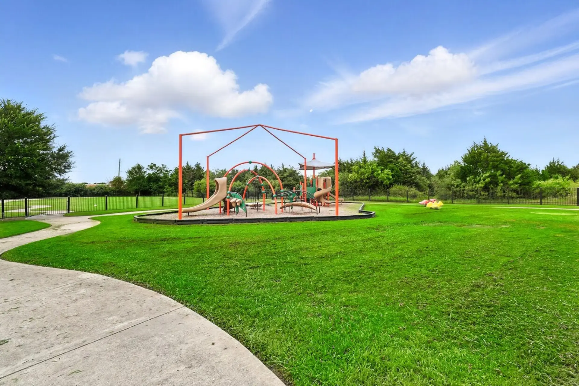 Playground in the middle of the big lawn